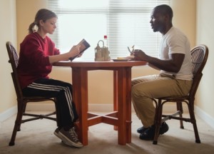 Ashley (Kate Mara) reads to Brian (David Oyelowo) over pancakes Photo: Evan Klanfer © 2015 Paramount Pictures. All Rights Reserved. 