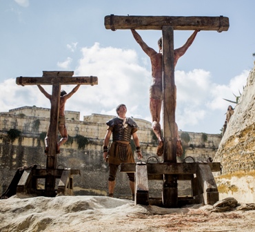 Jesus crucified along with other convicted criminals. Photo: Columbia Pictures ©2015 CTMG 